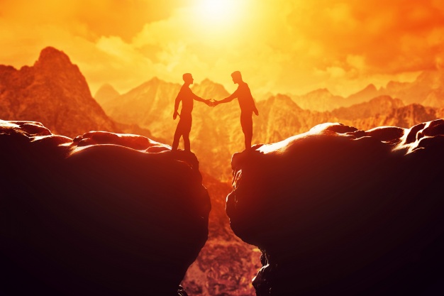 people-on-a-cliff-giving-himself-a-handshake_1160-629